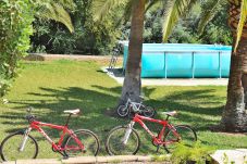 Herenhuis in Cala Murada - Casa Jardin 192 acogedora casa con piscina, gran zona exterior, barbacoa y bicicletas