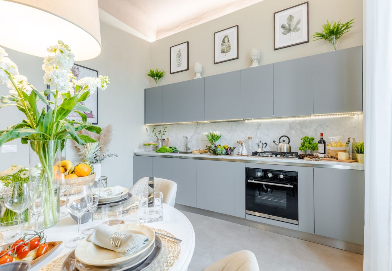 Apartamento en Lucca - Casa Gina, a modern charming urban retreat with free parking by the train station and the Walls of Lucca Apartamento en Lucca - Casa Gina, a modern charming urban retreat with free parking by the train station and the Walls of Lucca
