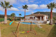 Garden with swimming pool, playground