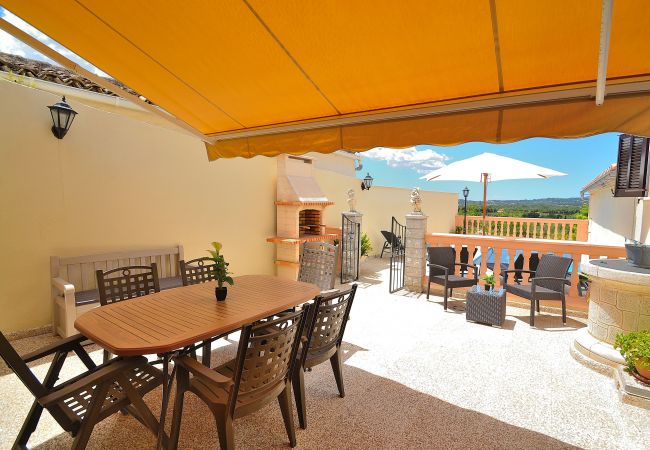 Stuga i Buger - Ca n'Aina Canta 064 acogedora casa de pueblo con piscina privada, terraza, barbacoa y aire acondicionado Stuga i Buger - Ca n'Aina Canta 064 acogedora casa de pueblo con piscina privada, terraza, barbacoa y aire acondicionado